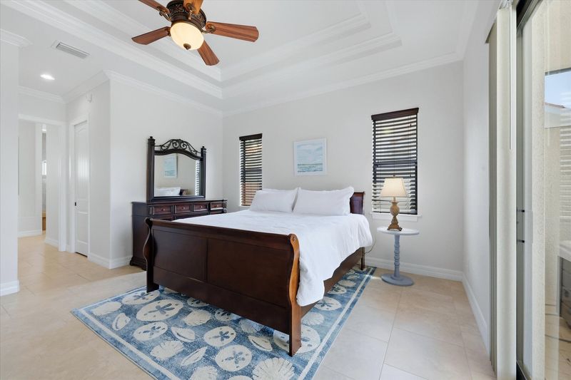 The primary bedroom features a king bed