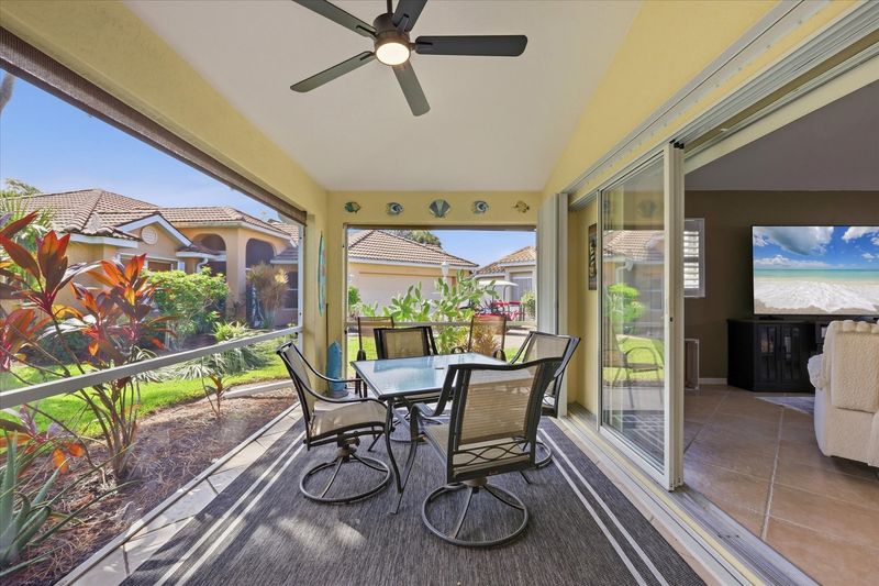 Screend-in patio overlooking lush landscaping