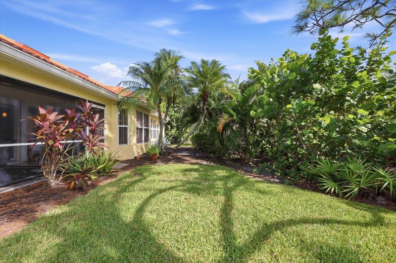 Screend-in patio overlooking lush landscaping