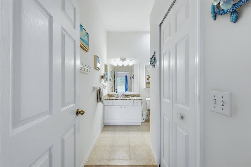 Primary attached bathroom with walk-in shower