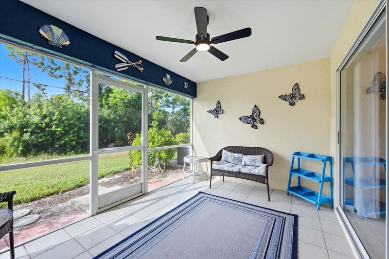 Screened-in patio overlooking the pond. No rear neighbors