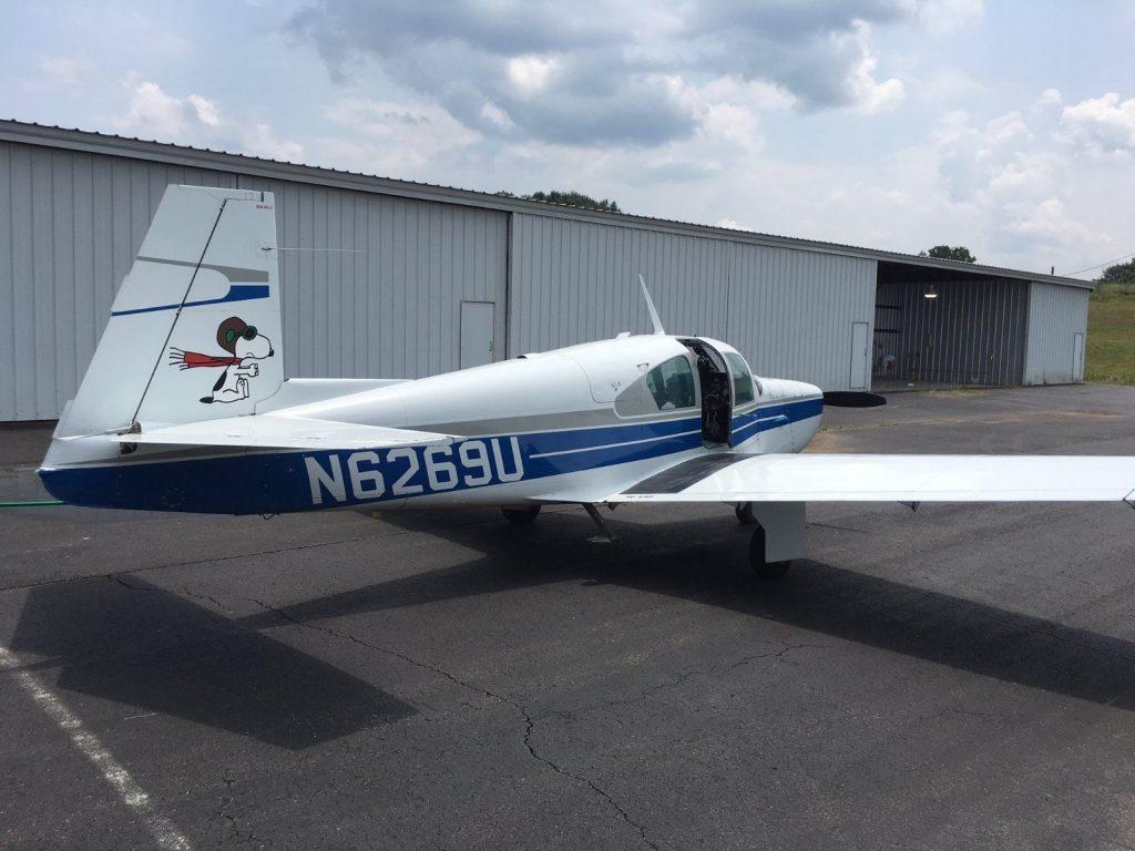 hangared 1962 Mooney M20C Mark 21 Ranger aircraft