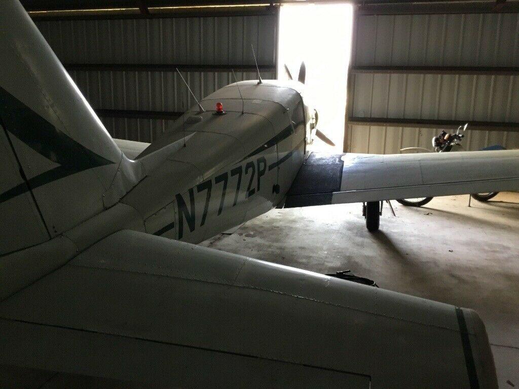 hangared 1961 Piper Comanche 180 aircraft