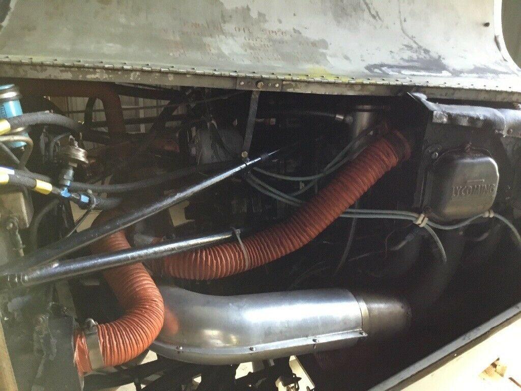 hangared 1961 Piper Comanche 180 aircraft