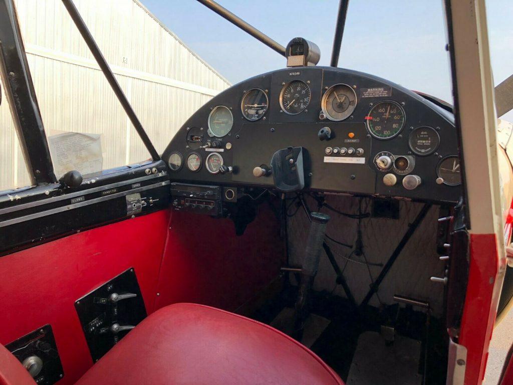 hangared 1947 Piper PA 12 Super Cruiser aircraft