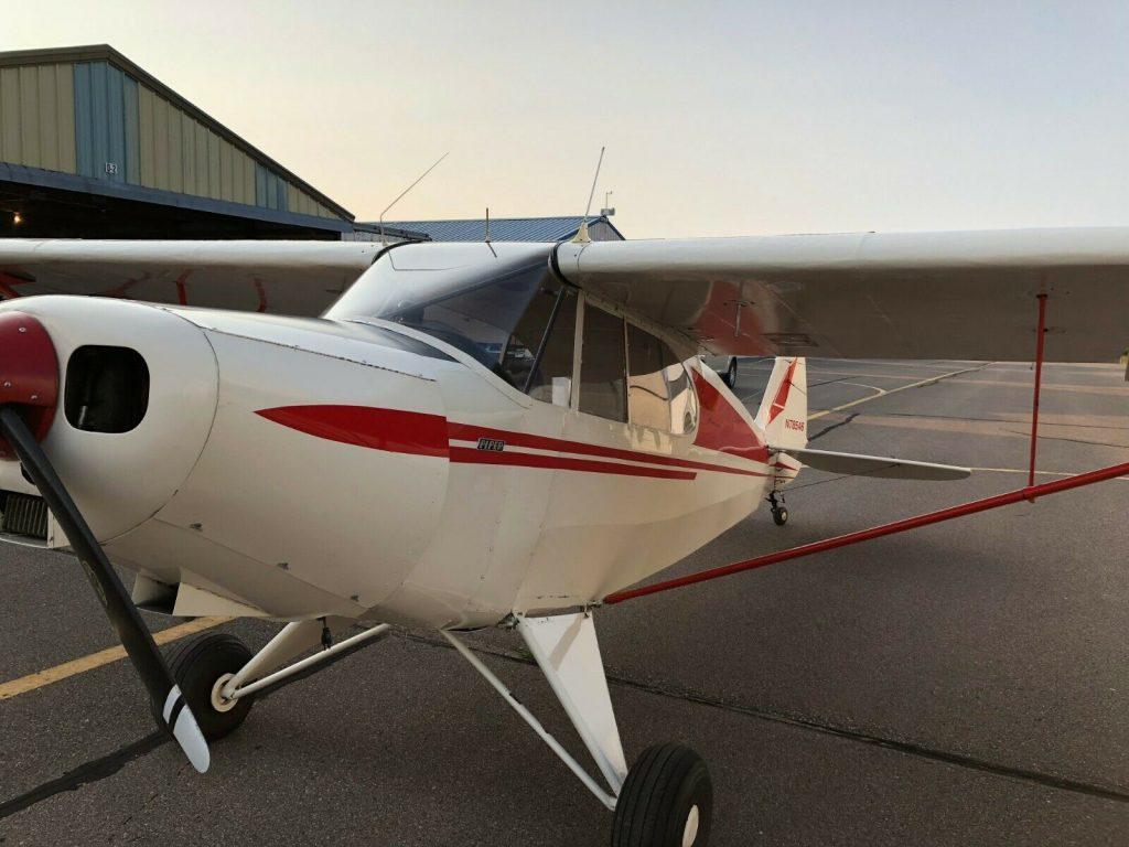 hangared 1947 Piper PA 12 Super Cruiser aircraft