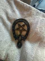 Vintage Black Cast Iron Horseshoe Trivet - Image 1