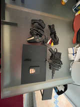 PlayStation 2 Slim with cables, controller, 16MB memory card, and some games.  - Image 1