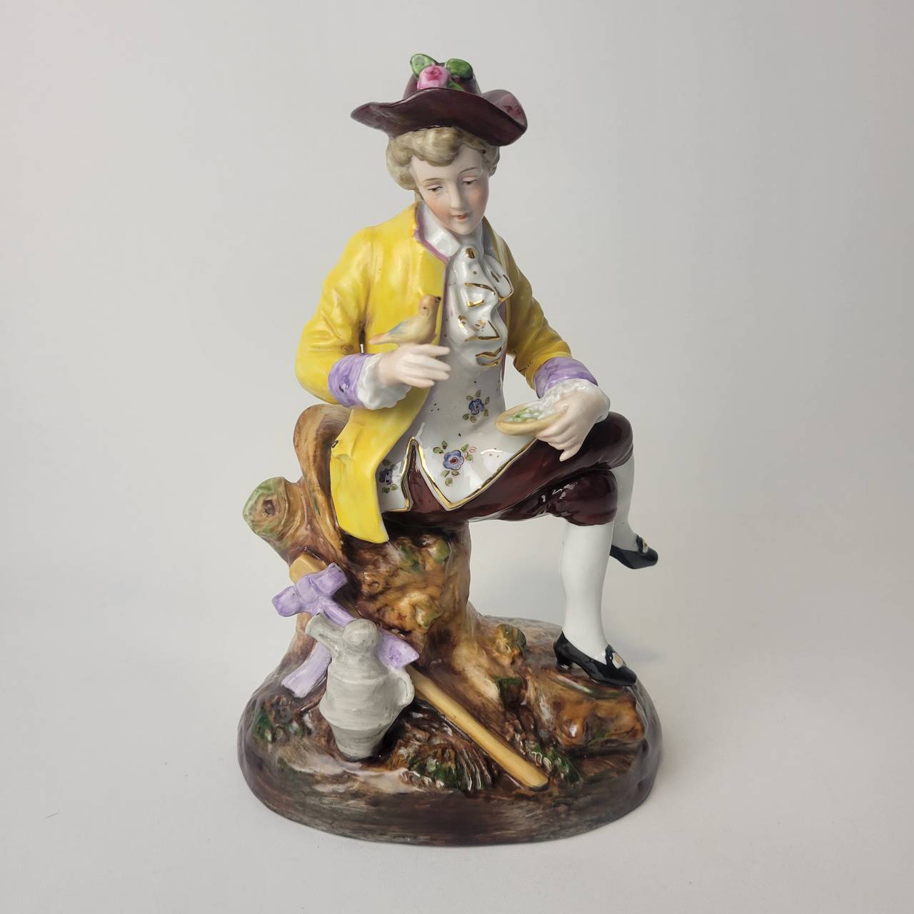 Vintage Porcelain Figurine Seated Gentleman with Bird