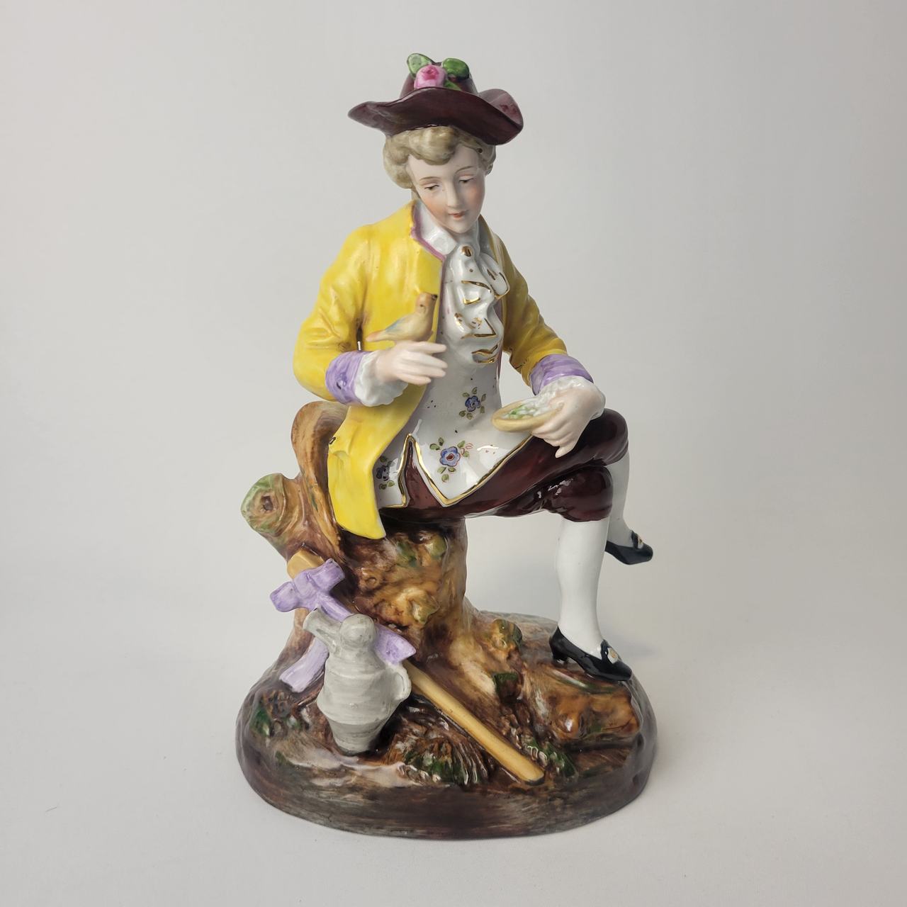 Vintage Porcelain Figurine Seated Gentleman with Bird