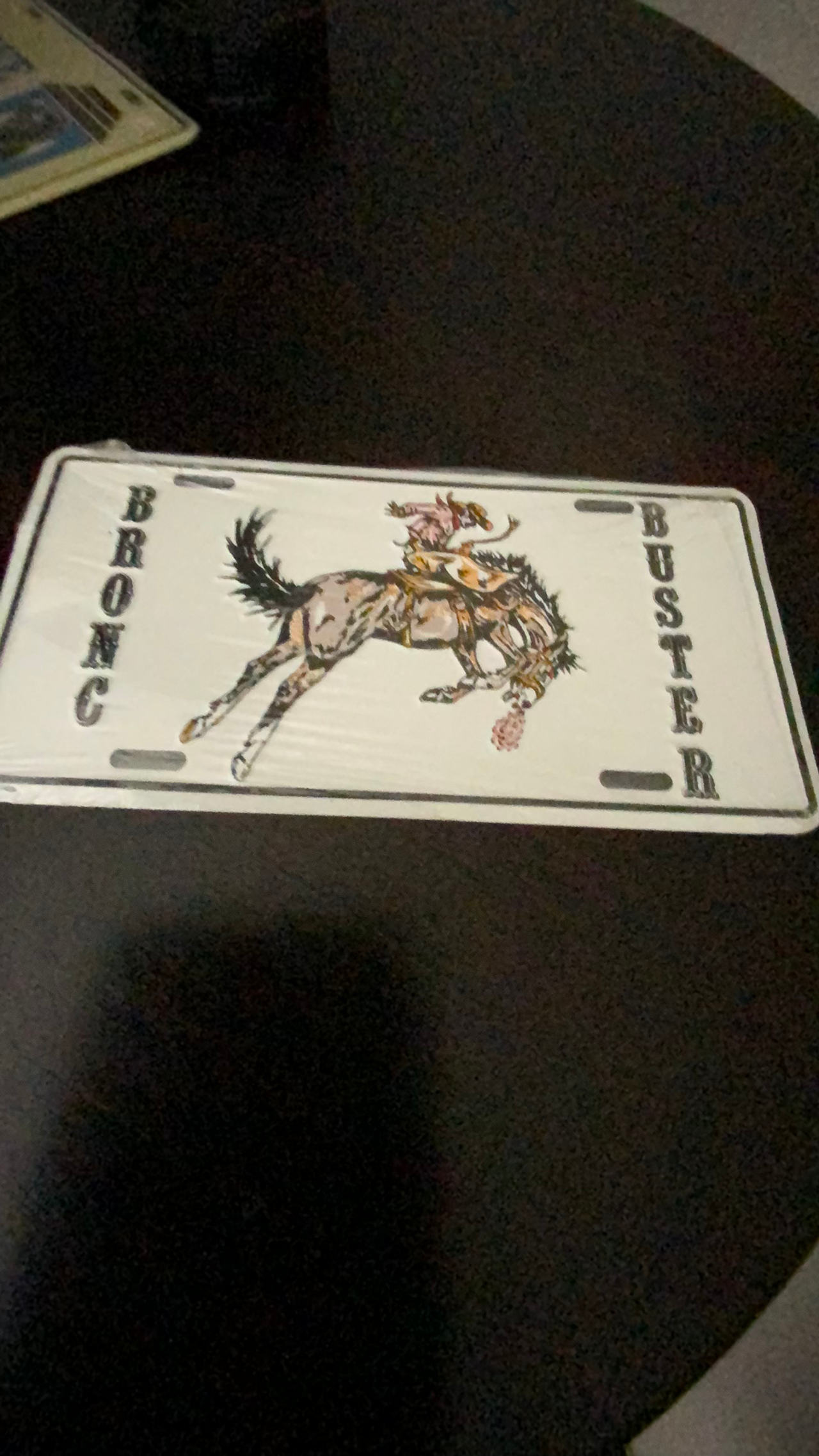 Vintage Bronc Buster License Plate