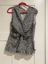 New York & Company Sleeveless Twist Front Top - Image 1