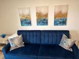 FULL ROOM DECOR-  Includes Navy Blue Velvet Tufted Sofa bed , rug , art , chair - Image 4