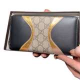 Gucci GG Canvas Leather Zippy Wallet - Image 1