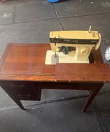 Singer 3102 Sewing Machine with Wooden Cabinet - Image 1
