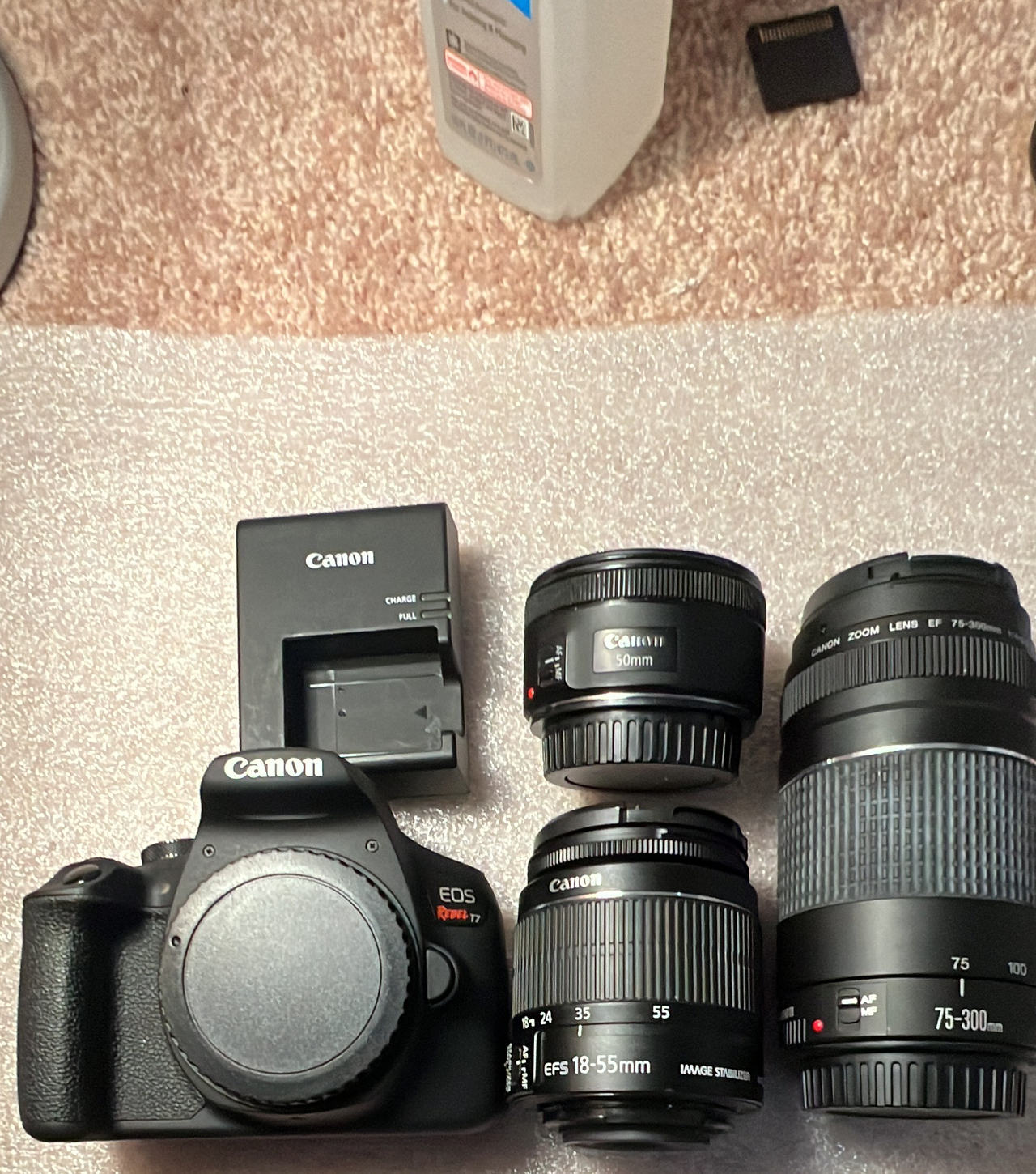 Canon EOS Rebel T7 DSLR Camera with 18-55mm, 75-300mm, and 50mm Lenses with bag