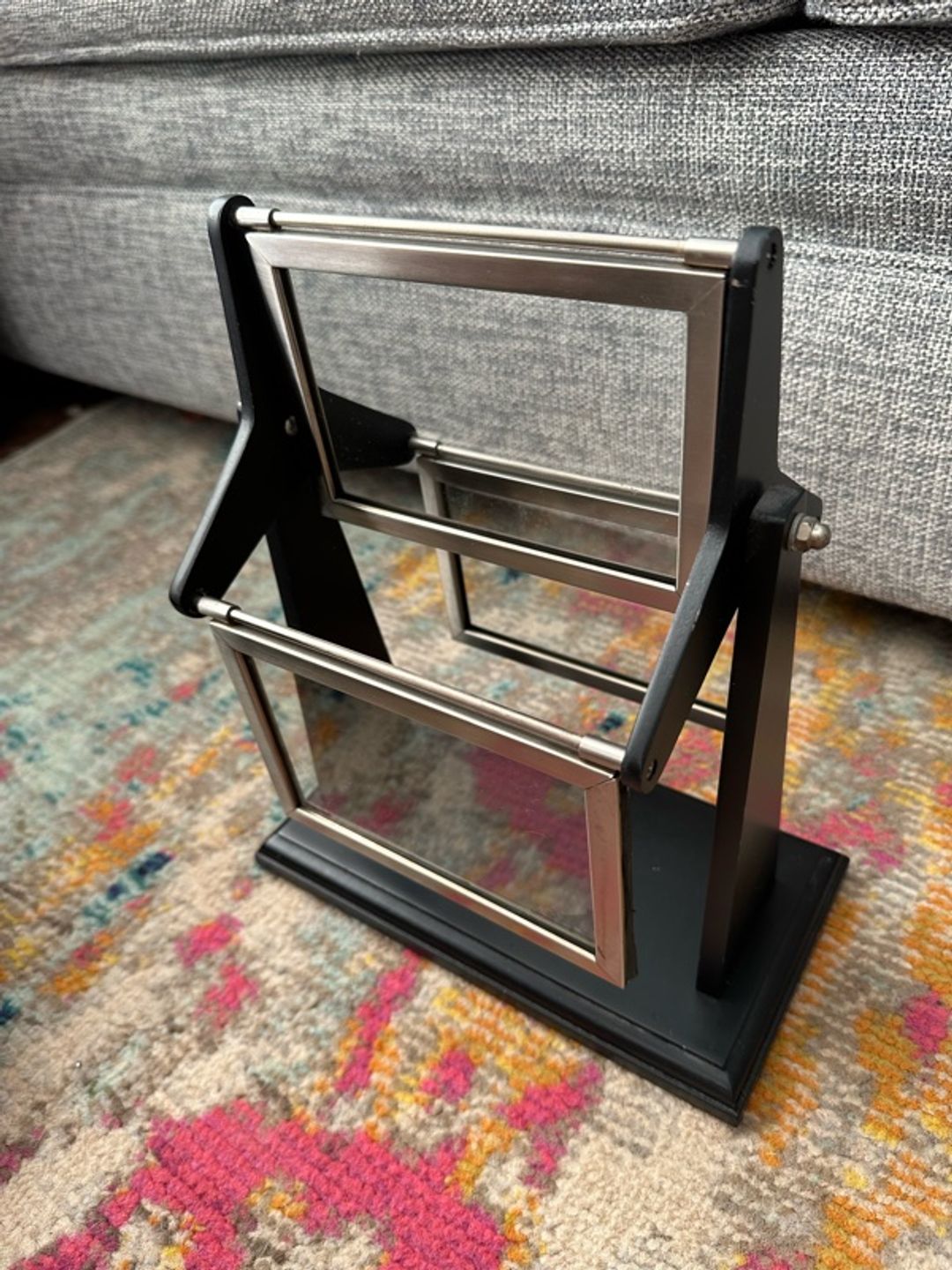 Rotating picture frame holder