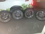 Aftermarket Chrome Wheels with Tires - Image 1