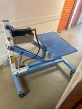 OTC 1585A 1,250 lb. Power Train Lift with Tilting Plate - Image 7
