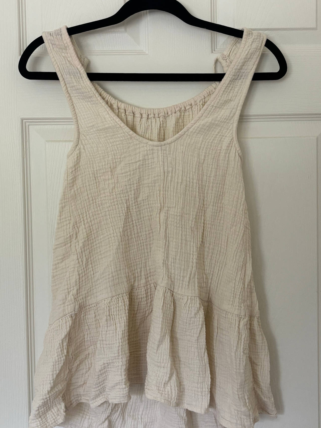Sleeveless Ruffle Hem Top