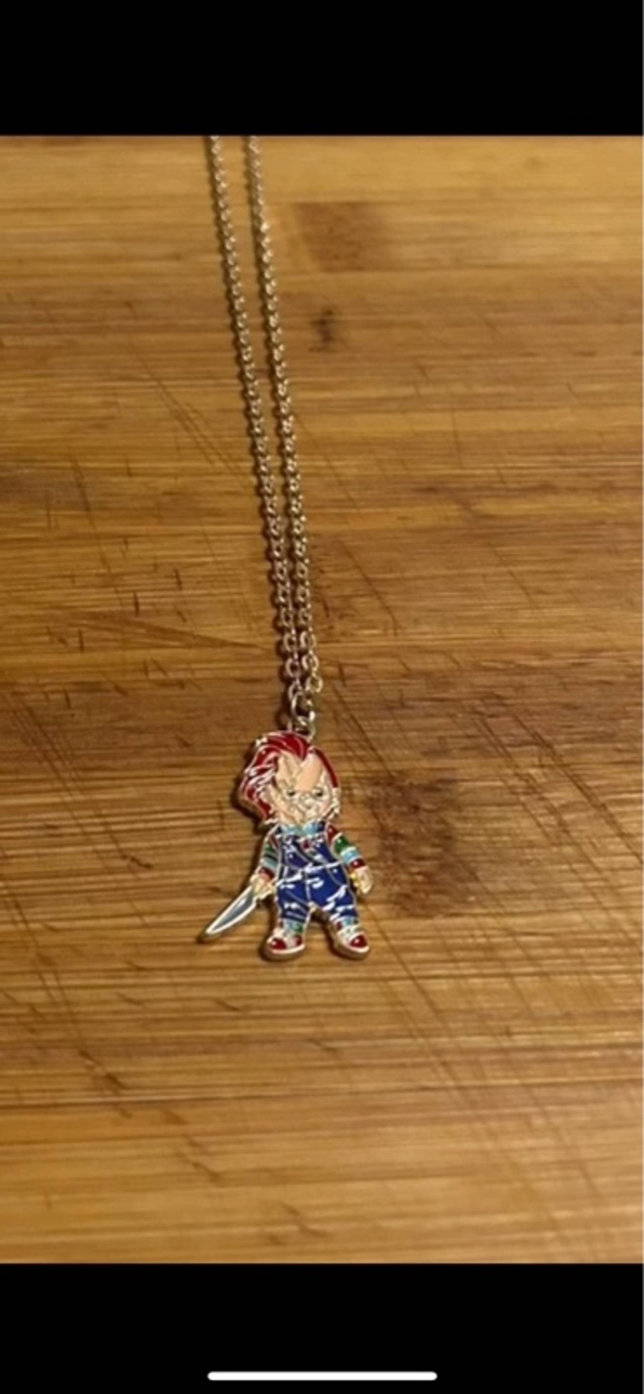 Stand out with this Chucky pendant necklace! Detailed design and clean shine
