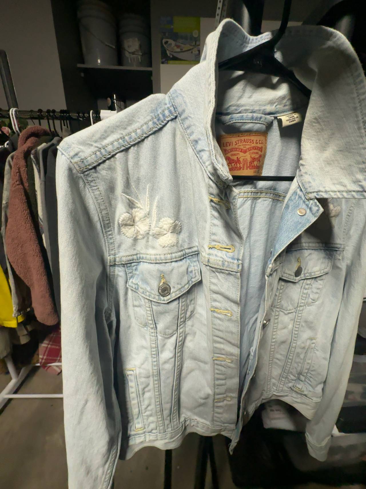 Women’s Levi's Denim Jacket Blue with floral stitching size XL, (fits short)