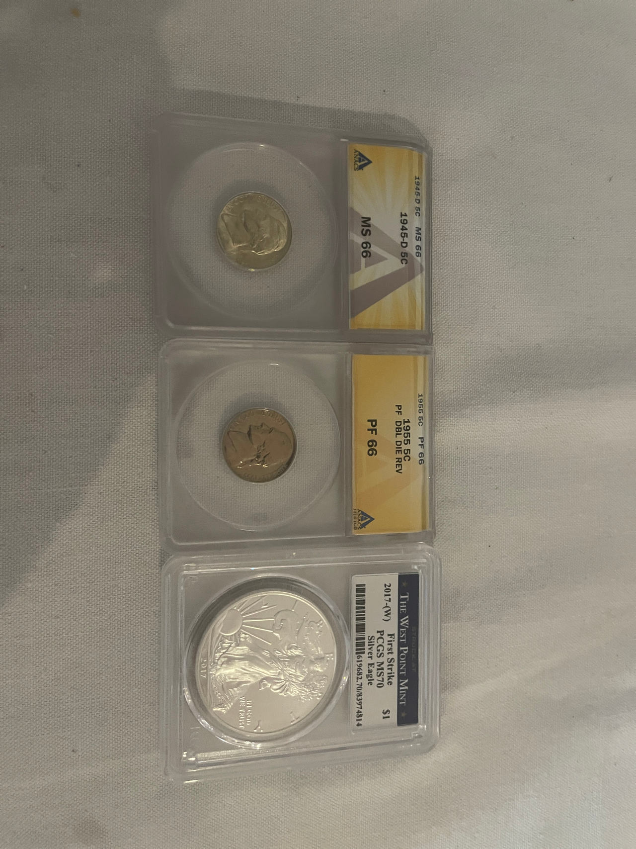 3-Coin Lot: 1945 & 1945-D Walking Liberty Half Dollars (MS66) + 2017-W Silver Ea