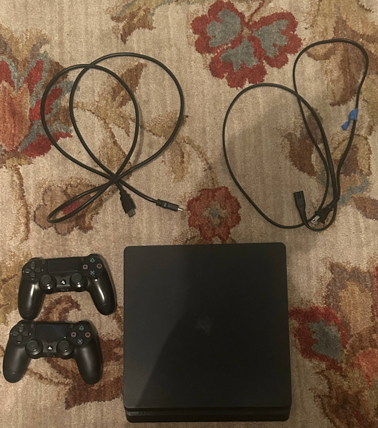 Sony PlayStation 4 Slim with 2 Controllers