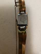 Vintage Seiko Women's Gold Tone Cocktail Watch with Purple Dial - Image 1