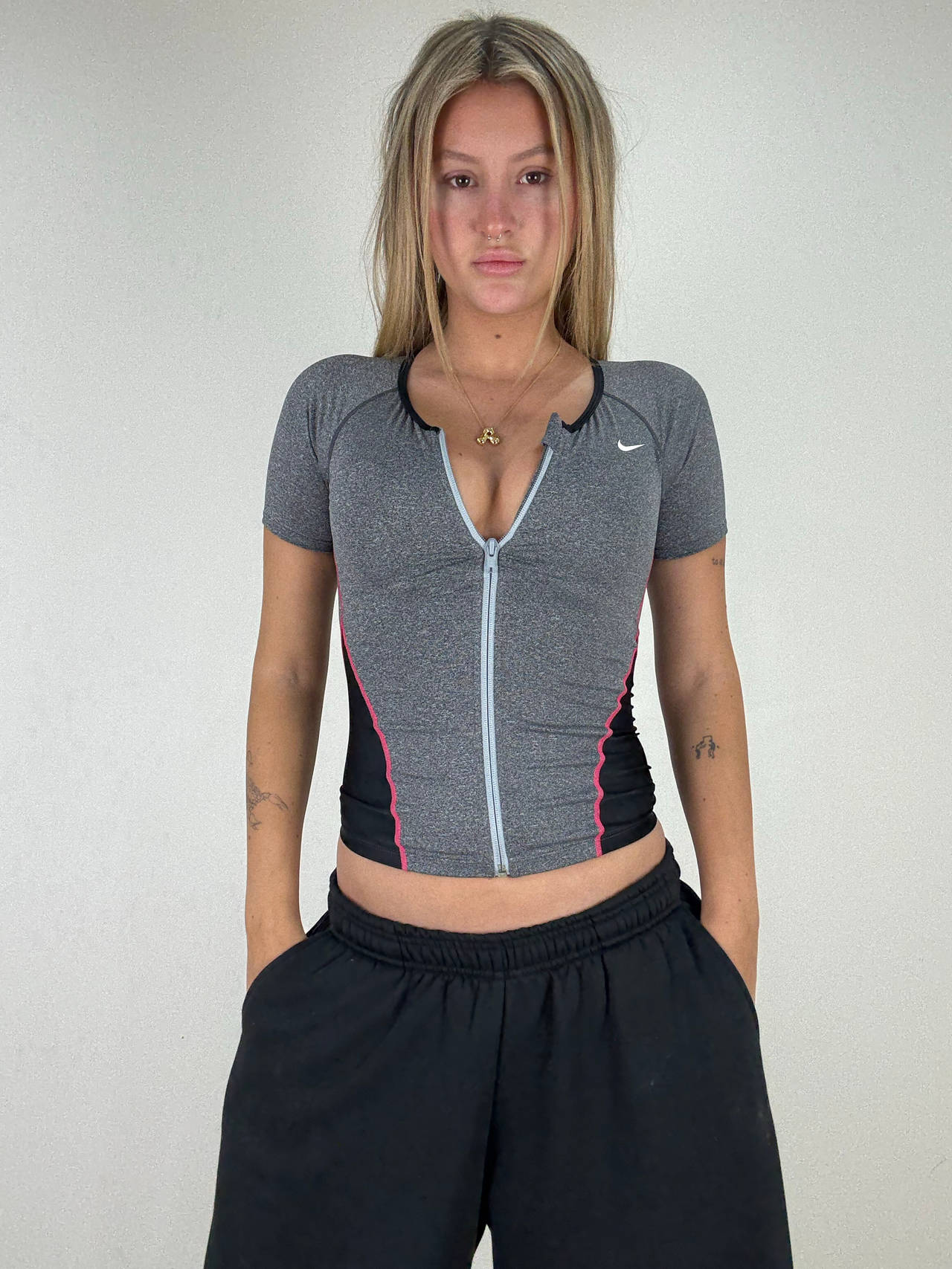 Nike Women's Short Sleeve Zip-Up Top