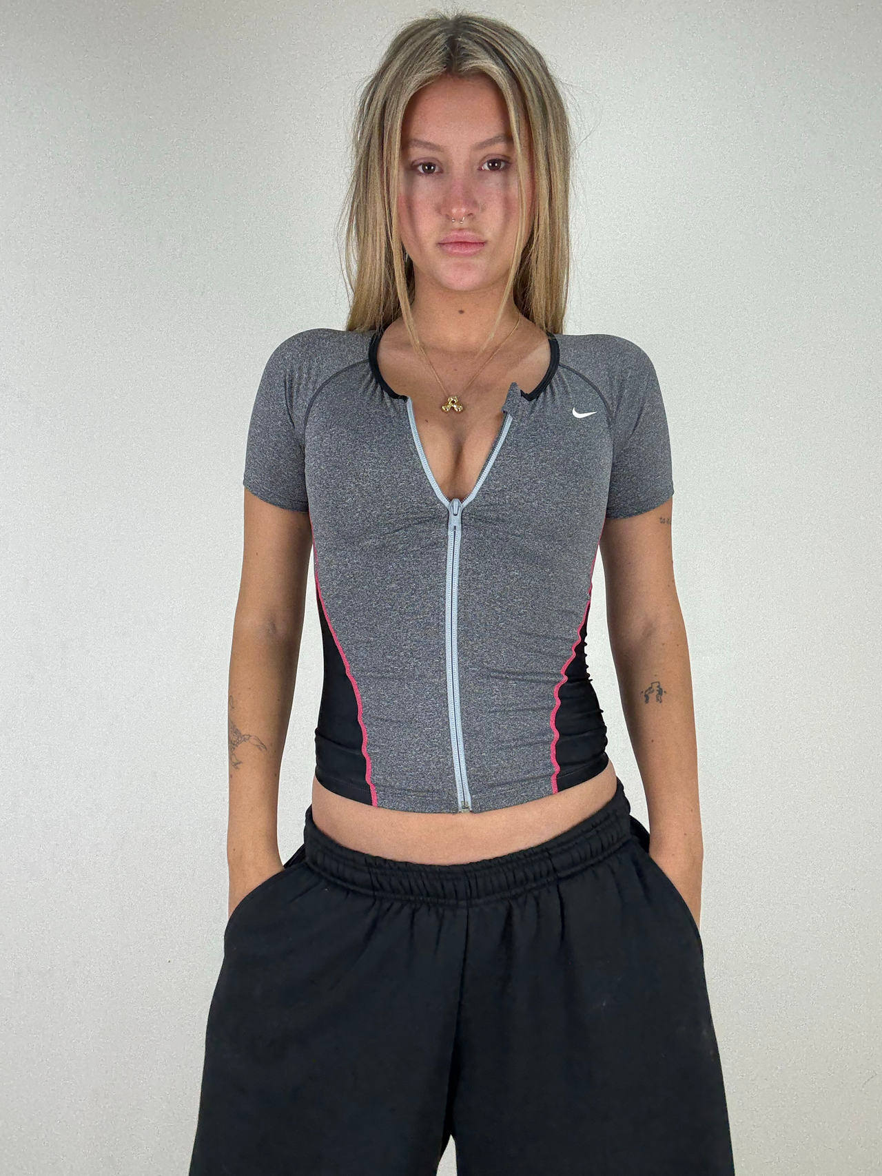 Nike Women's Short Sleeve Zip-Up Top