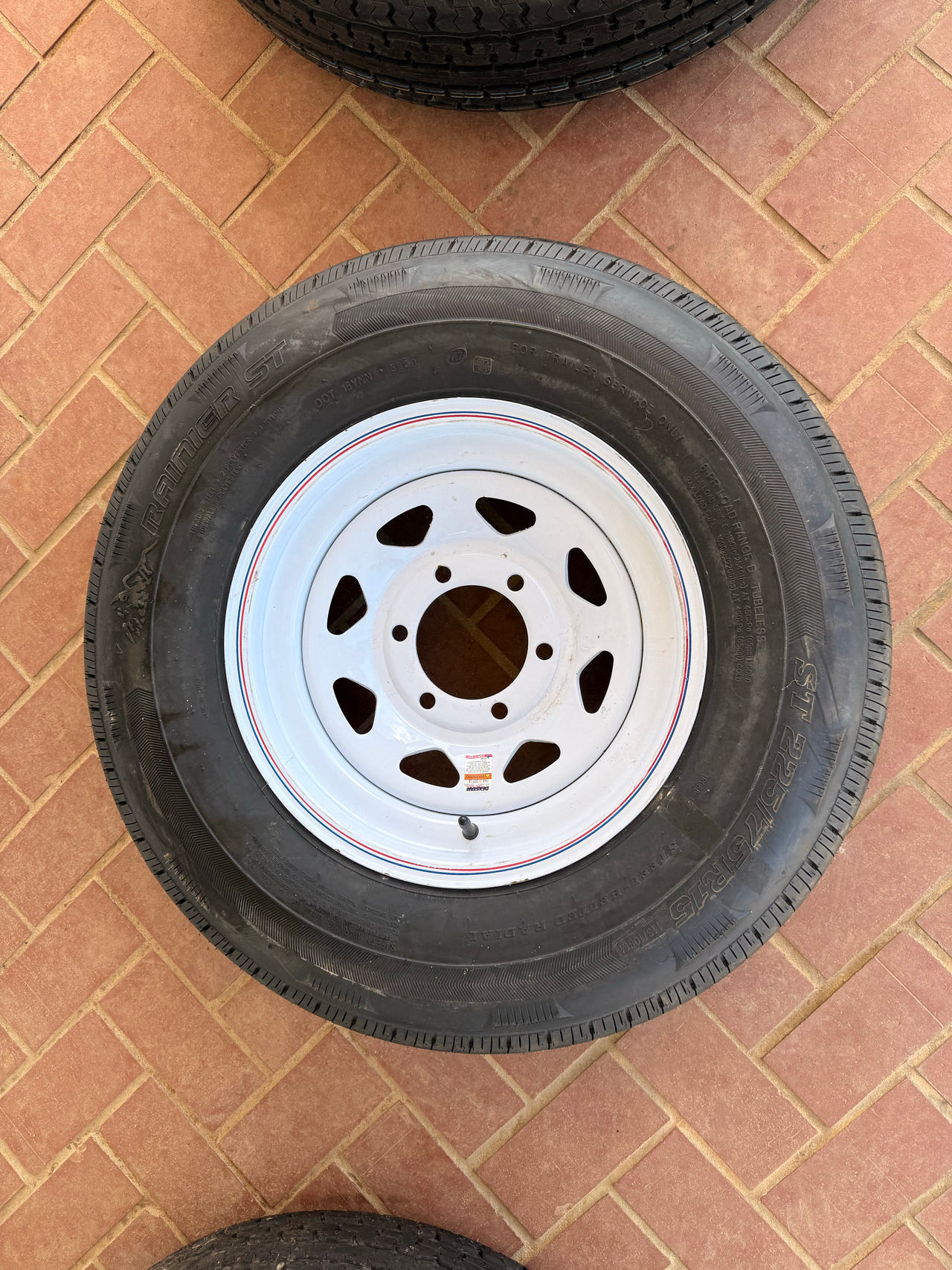 Ranier ST225/75R15 Trailer Tire on White Steel Spoke Rim