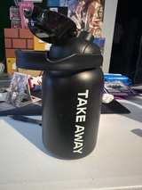 Stainless Steel Insulated Water Bottle Black Canister TAKE AWAY Lid and Hand - Image 3