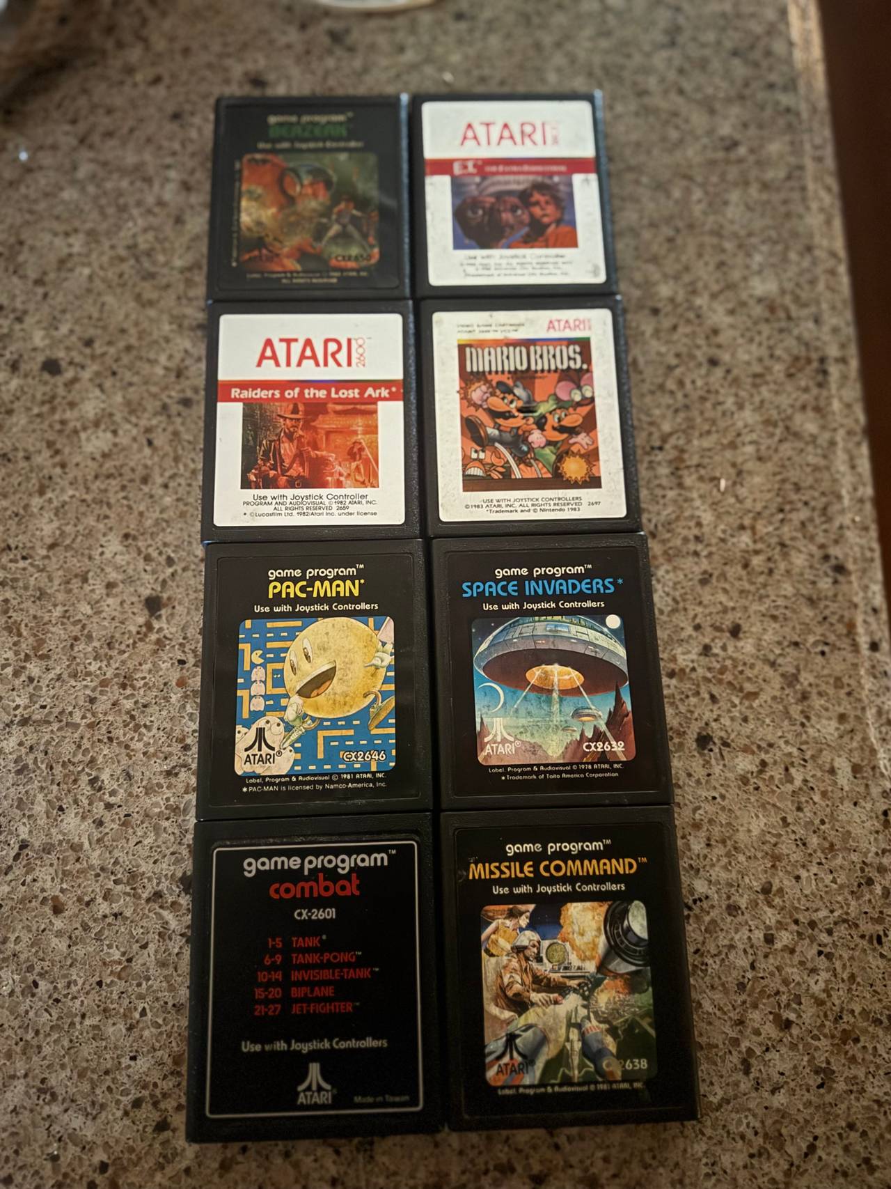 Lot of 8 Vintage Atari 2600 Games – Mario Bros, Pac-Man, E.T., Raiders, More 