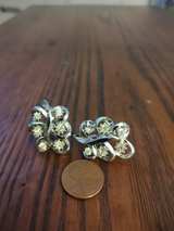 Vintage Silver-Tone Rhinestone Swirl Clip-on Earrings - Image 3