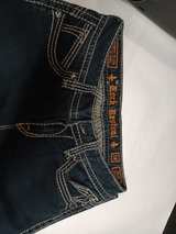 Rock Revival Women's Skinny Jeans with Rhinestone Pockets - Image 3