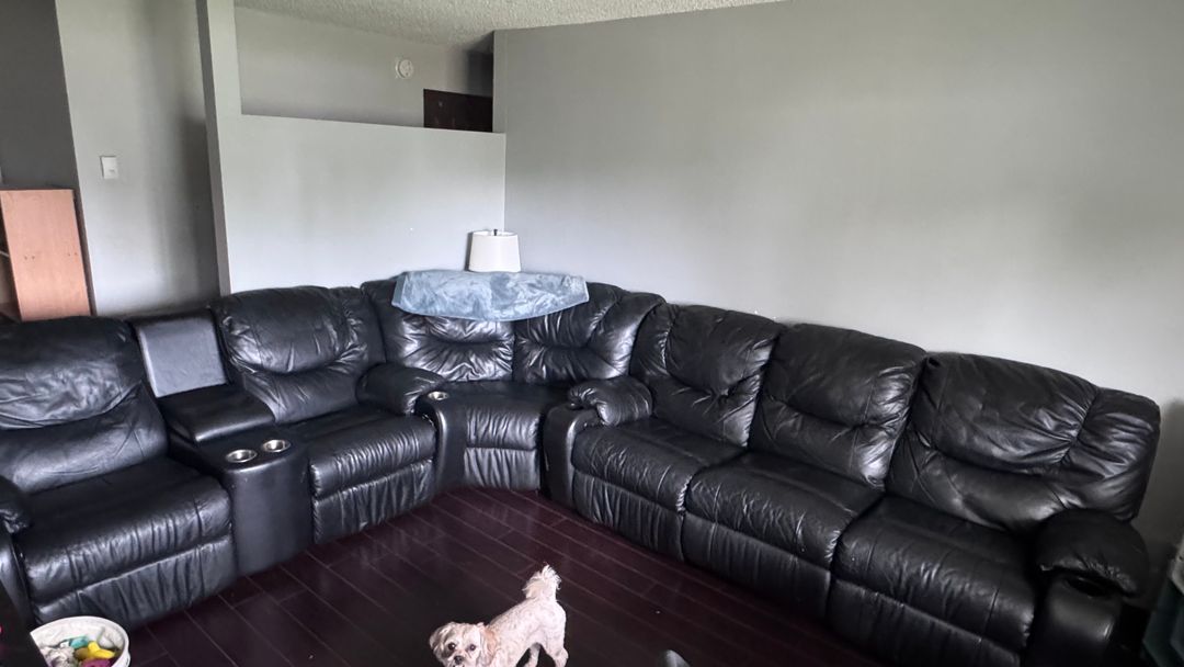 Black Leather Reclining Sectional Sofa