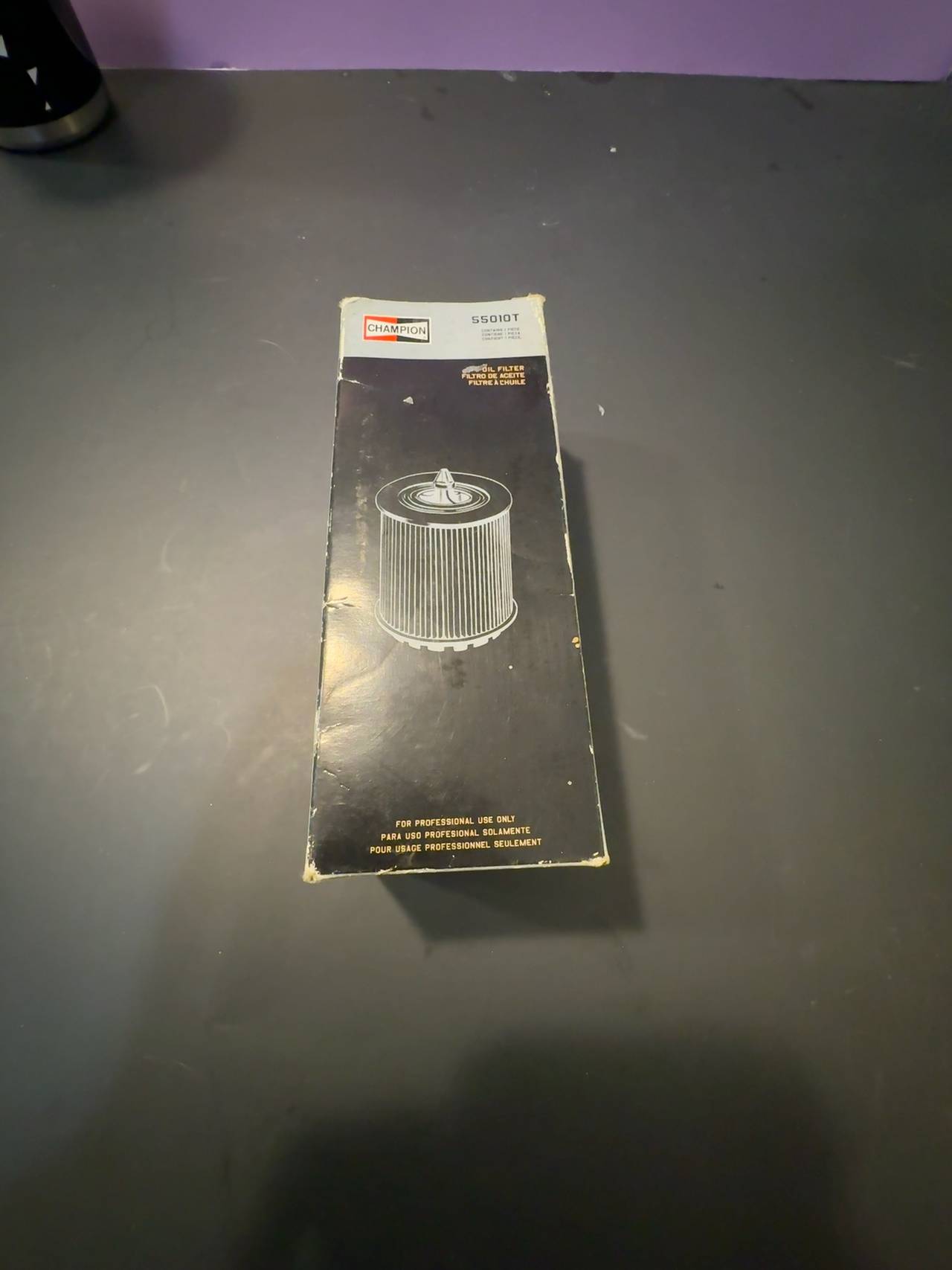 Champion 55010T Engine Oil Filter with Gasket – New in Open/Worn Box