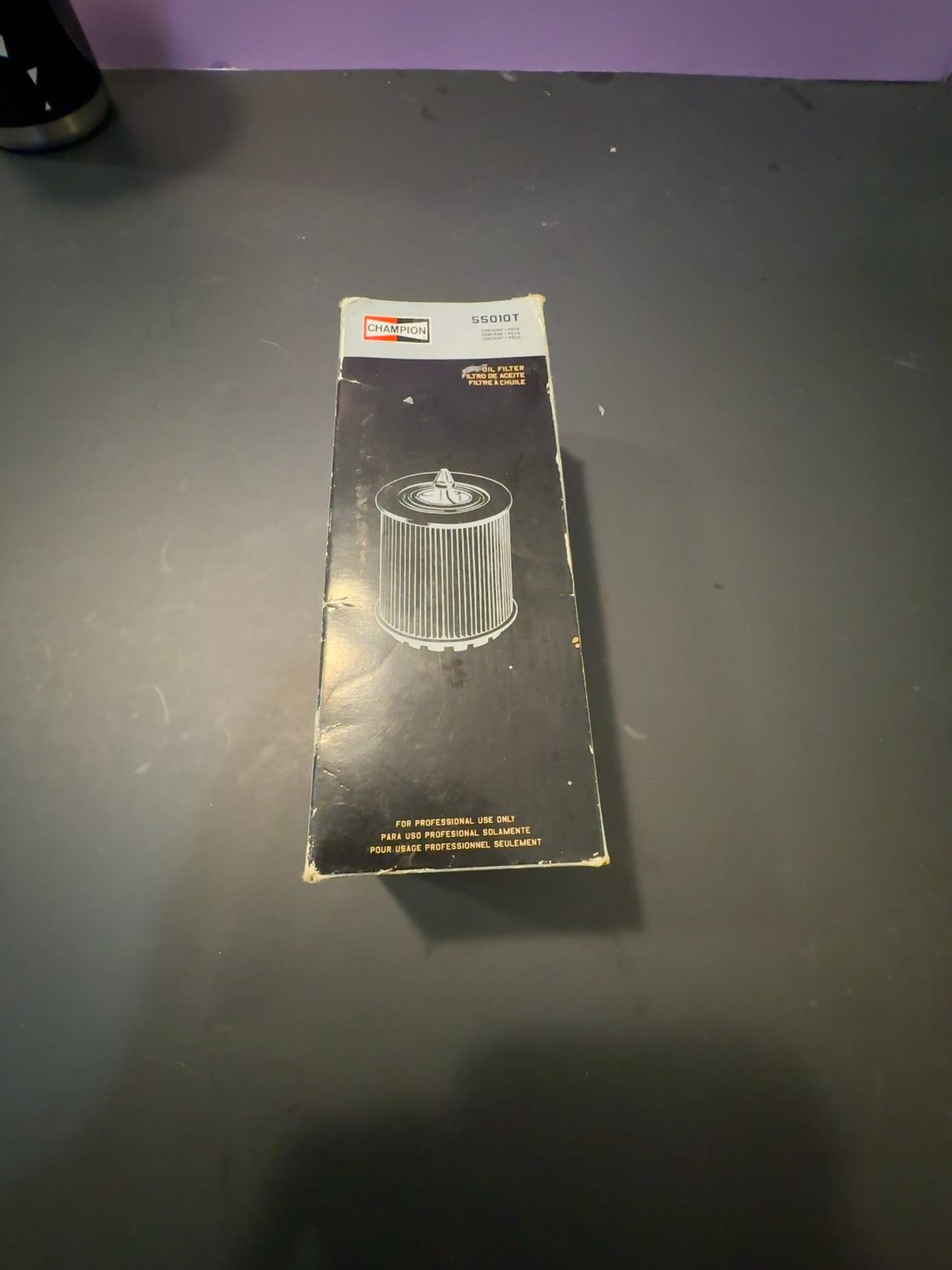 Champion 55010T Engine Oil Filter with Gasket – New in Open/Worn Box