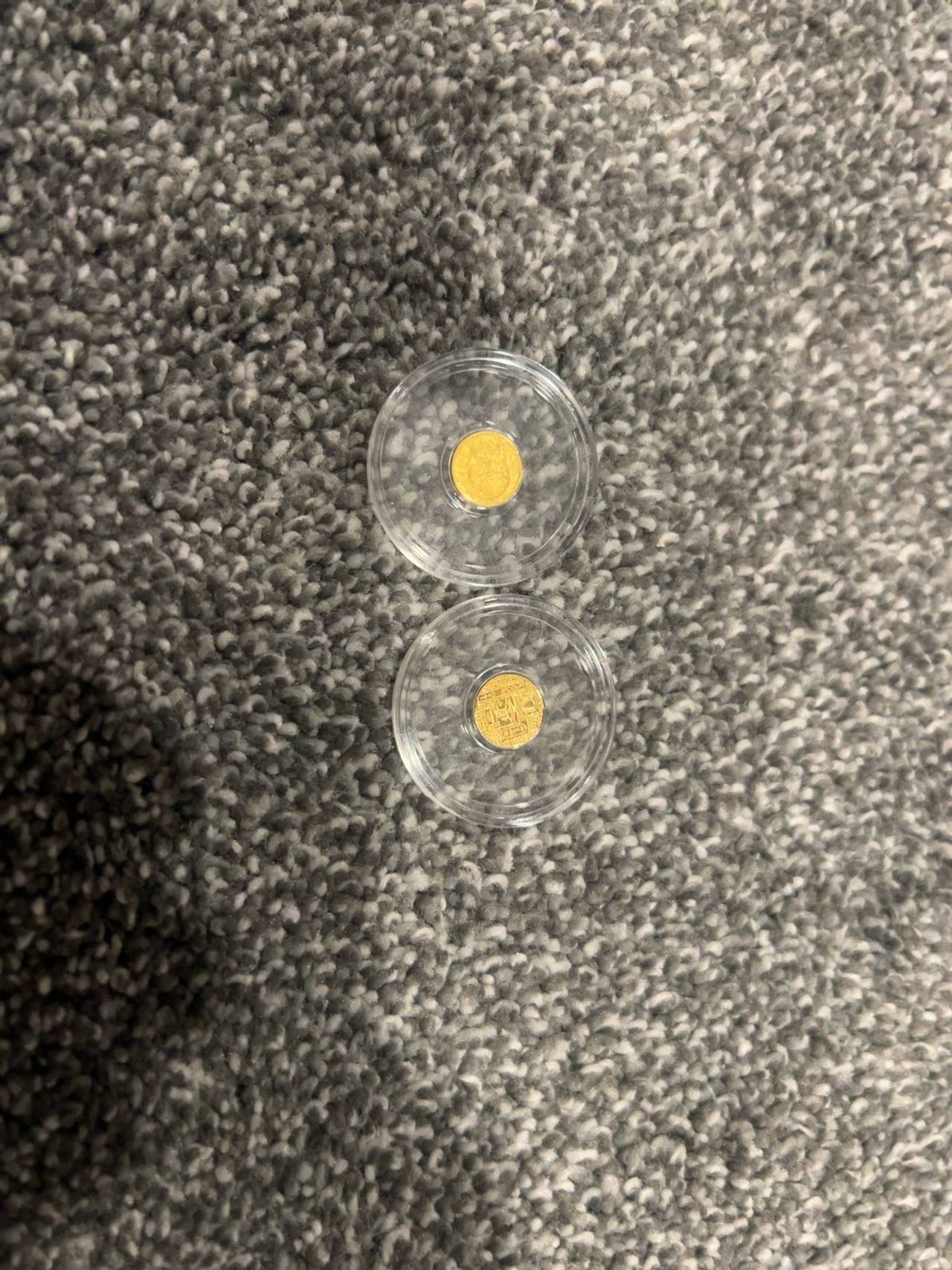 (2)  1/200th oz gold coins  1 skull 1 Egyptian 