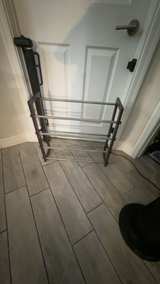 Simplify Dark Wood and Metal 4-Tier Expandable Shoe Rack - Image 1