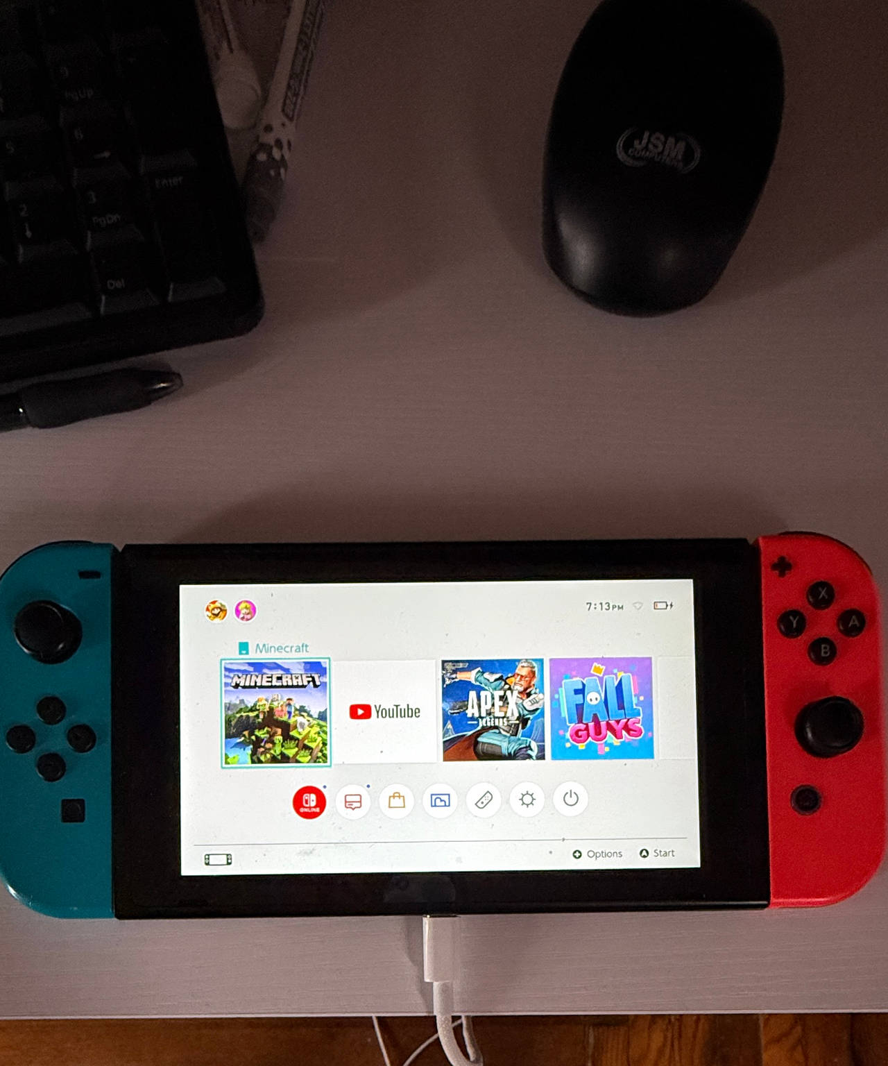 Nintendo Switch with Neon Blue and Neon Red Joy-Con