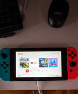 Nintendo Switch with Neon Blue and Neon Red Joy-Con - Image 1