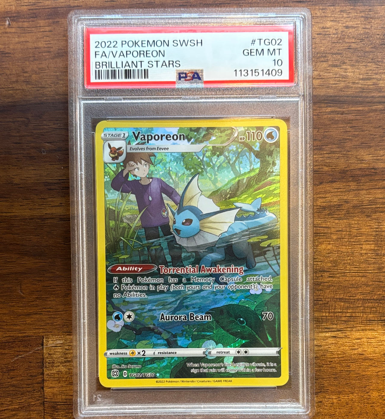 2022 Pokemon SWSH Brilliant Stars Vaporeon Trainer Gallery TG02 PSA 10