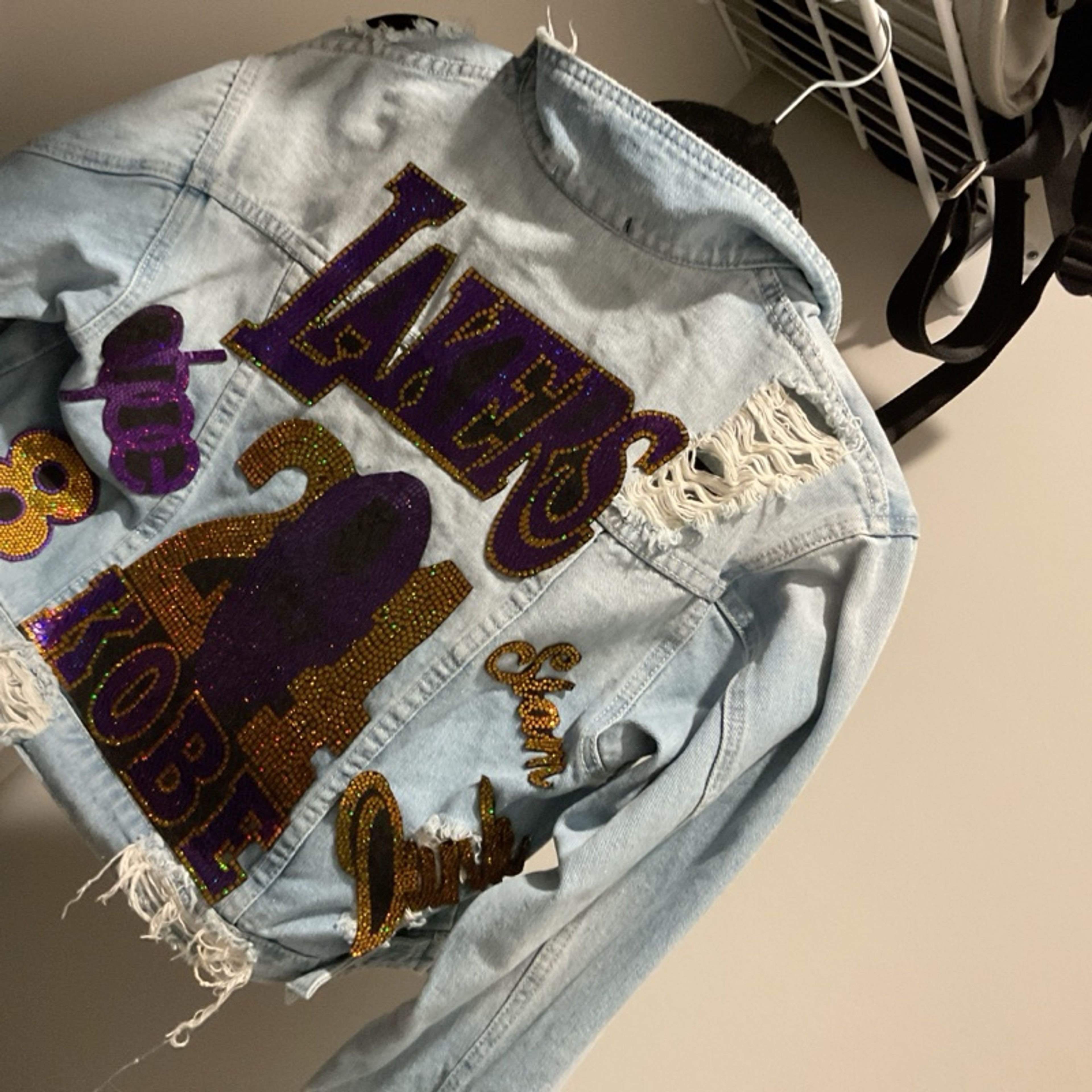 Los Angeles Lakers Women's Distressed Denim Jacket
