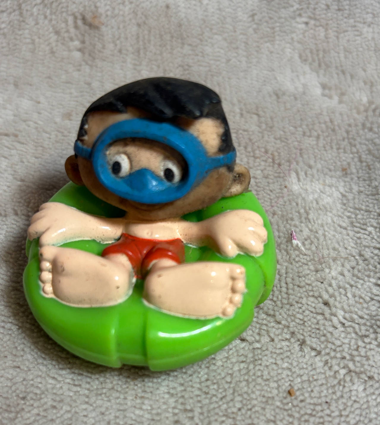Vintage Boy in Inner Tube Toy Figure