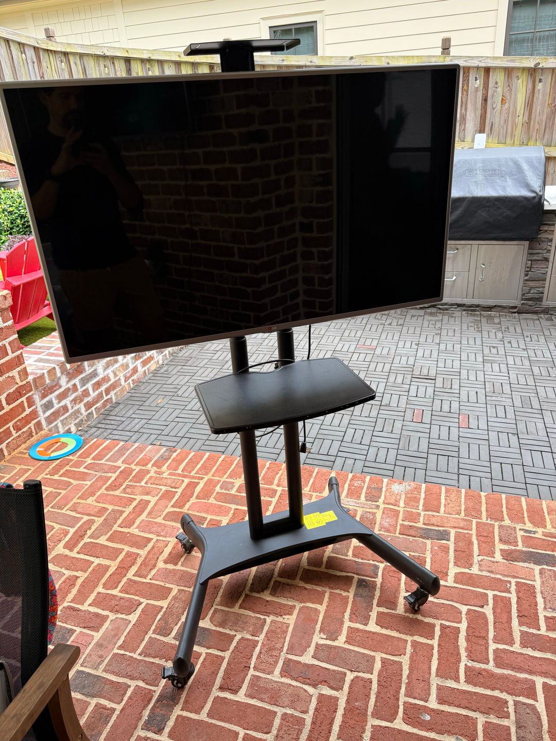 TV Stand with Wheels and LG TV