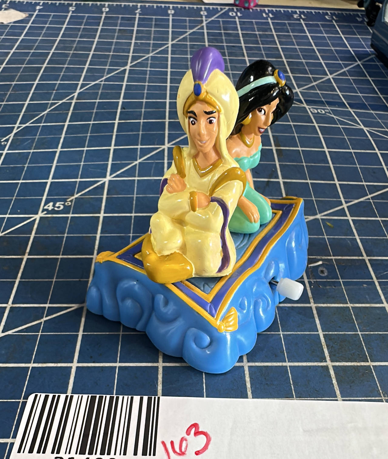 Disney Aladdin Jasmine vintage 1990s Disney park Magic Carpet Wind up 163