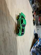 Hot Wheels Mazda RX-7 Green Die-Cast Car - Image 1
