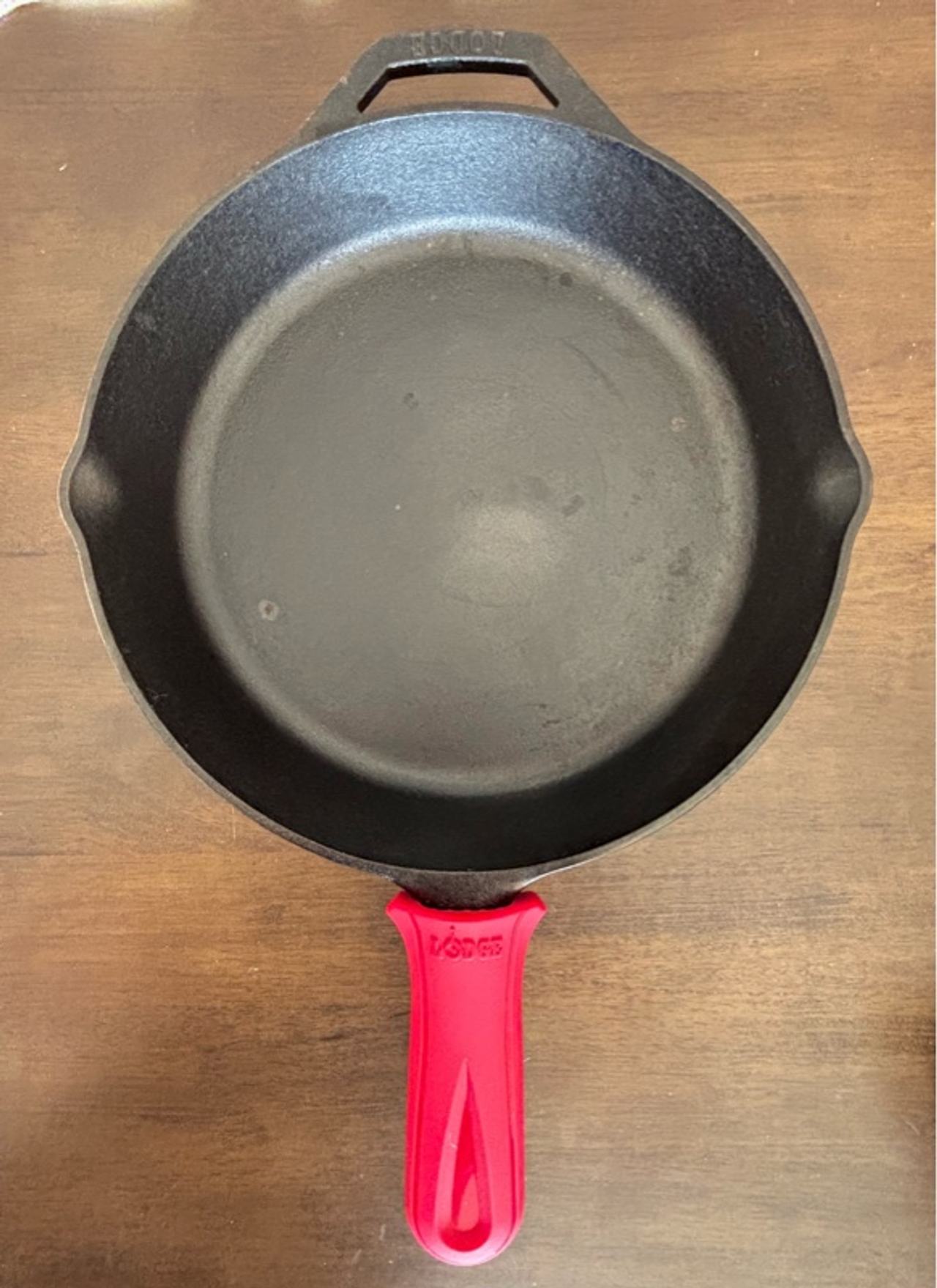 Lodge Cast Iron Skillet with Red Silicone Handle 10.25"